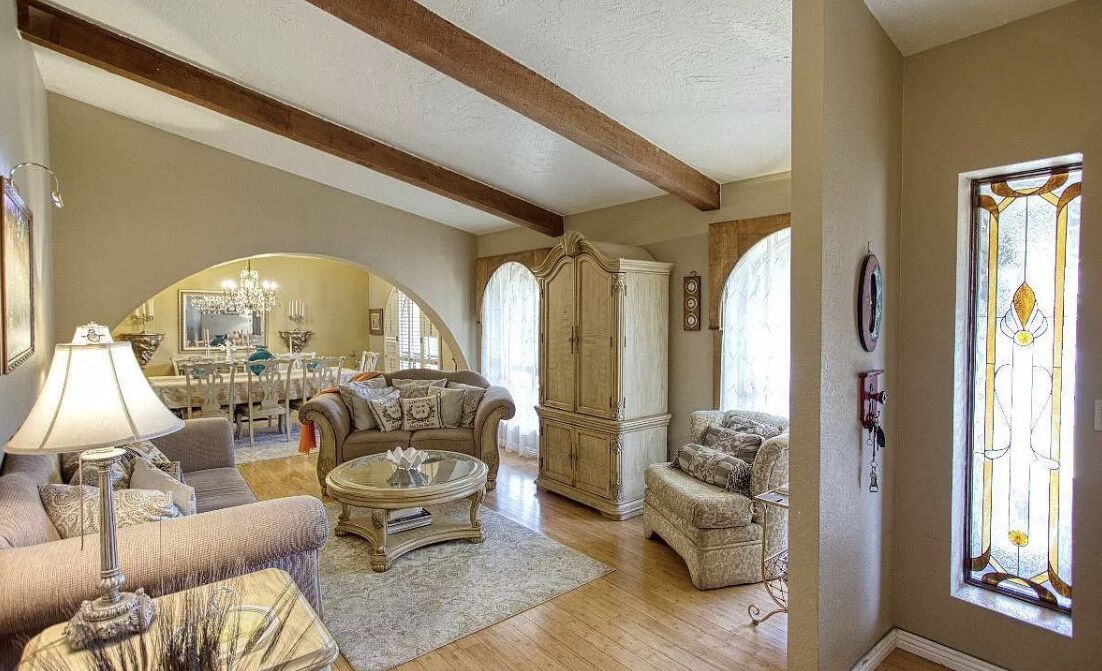 Smart TV, fireplace, books, computer monitors