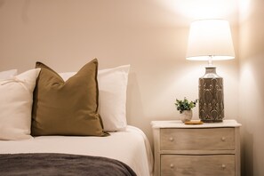 1 bedroom, desk, iron/ironing board, travel crib