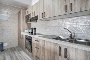 Fridge, microwave, oven, stovetop - Apartment Puerto Chico 1 with Sea View, Garden and Shared Heated Pool (Playa Blanca,)