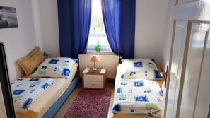 2 bedrooms, travel crib, WiFi, bed sheets