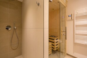 Douche, serviettes fournies