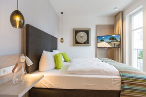 2 chambres, coffres-forts dans les chambres, Wi-Fi, draps fournis