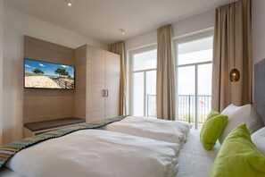 2 chambres, coffres-forts dans les chambres, Wi-Fi, draps fournis