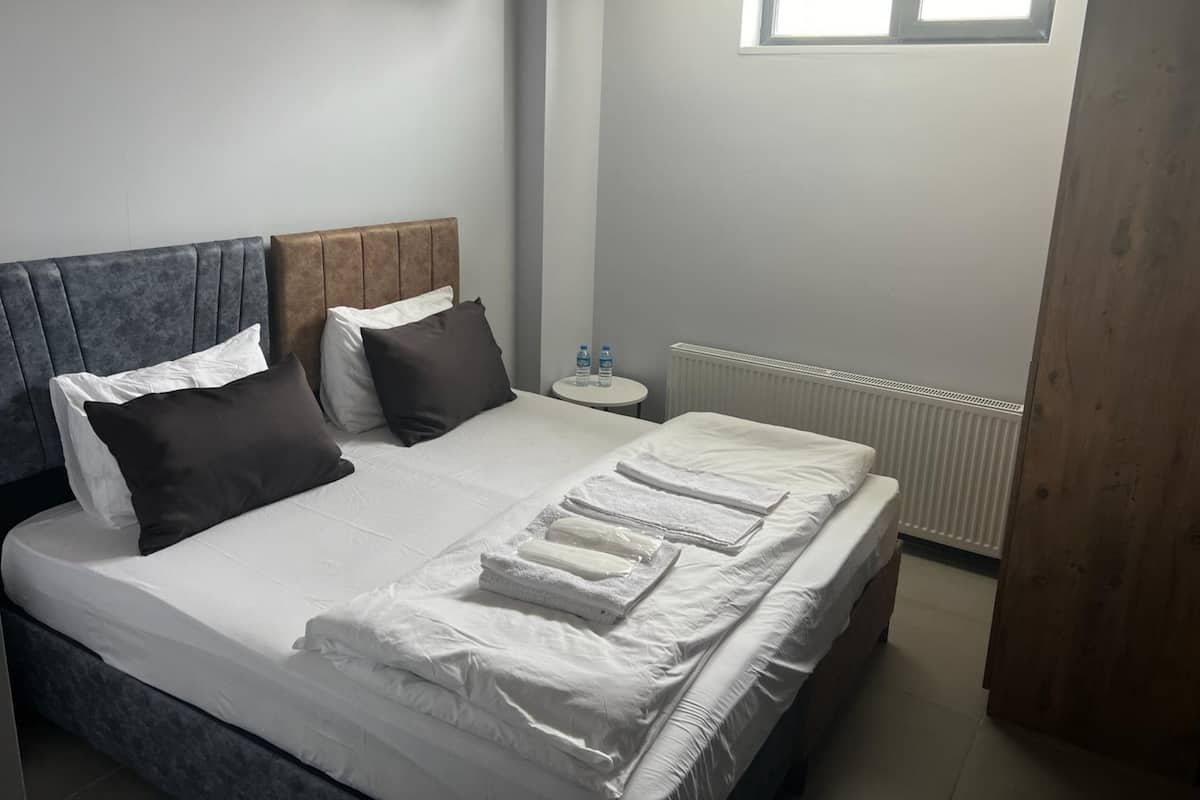 Ekonomik Oda | 1 slaapkamer, een minibar, gratis wifi, beddengoed