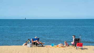 On the beach, sun-loungers, beach towels
