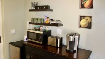 Fridge, microwave, coffee/tea maker, toaster