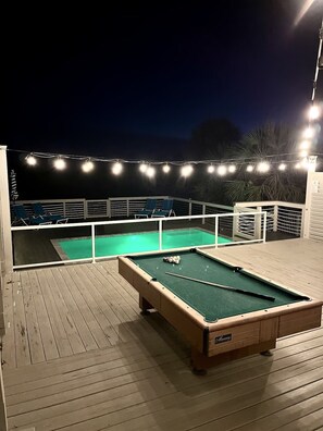 Relax by the pool with a game of pool or unwind in a lounge chair.