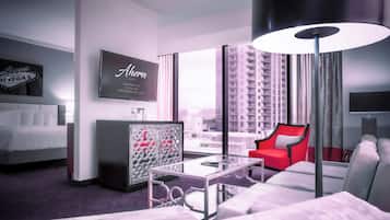 Signature Suite | Living area | 42-inch flat-screen TV with satellite channels, TV