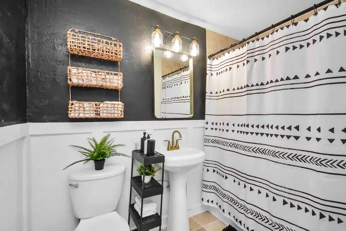 Bathtub, hair dryer, towels, soap