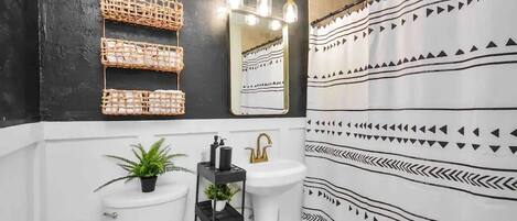 Bathtub, hair dryer, towels, soap