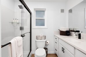 Shower, hair dryer, towels, soap