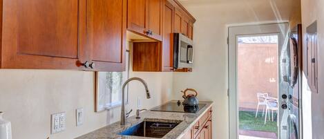 Fridge, microwave, stovetop, coffee/tea maker