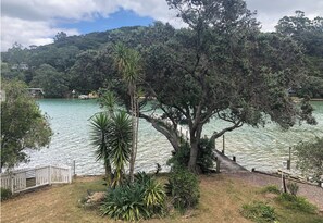 Escape to a serene lakeside retreat with a tranquil atmosphere, perfect for relaxation and leisure activities.