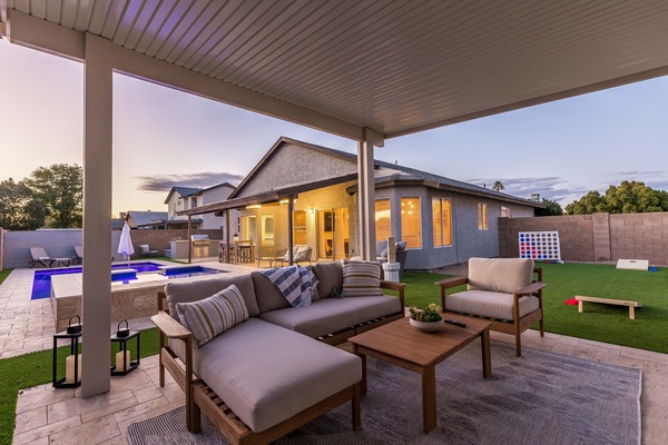 Outdoor Pergola, Sofa, and 75” Smart TV to stream your favorite shows!