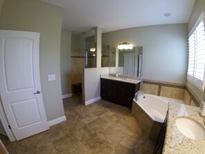 Combined shower/tub, hair dryer, towels, toilet paper