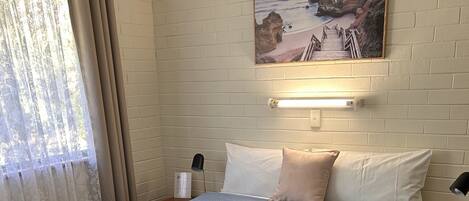 1 dormitorio, tabla de planchar con plancha, cuna de viaje y wifi gratis