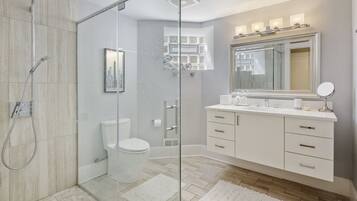 Combined shower/tub, hair dryer, towels, soap