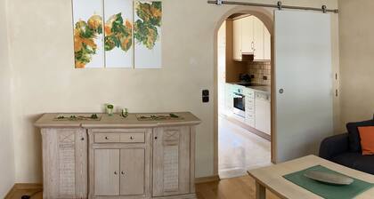 Bright and cozy vacation apartment with covered balcony in Mediterranean style!