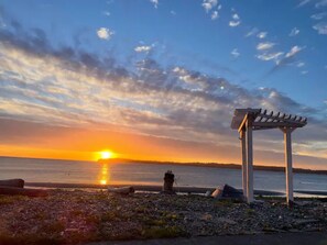 On the beach, sun loungers, beach towels