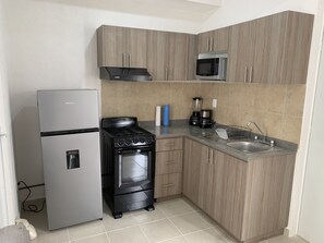 Fridge, microwave, oven, stovetop