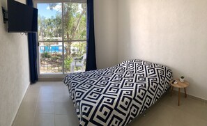 2 dormitorios, tabla de planchar con plancha, wifi gratis y ropa de cama