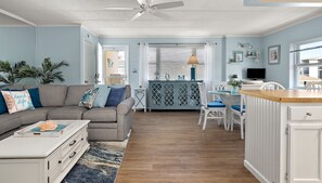 Smart TV, fireplace, books, computer monitors