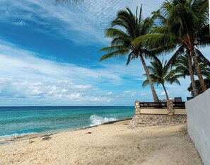 On the beach, sun-loungers, beach towels