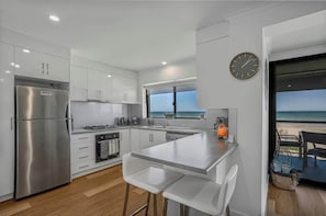 Fridge, microwave, oven, stovetop - Absolute beachfront 2 bedroom unit Sandy Feet 3 (Semaphore Park)