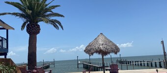 Waterfront Oasis with private pool, Hot tub and 200 ft. Lighted fishing pier