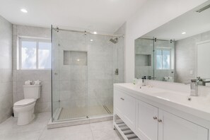 Shower, hair dryer, towels