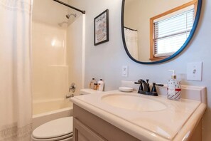 Combined shower/tub