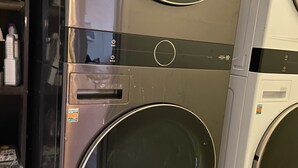 A row of stacked washing machines in a showroom. - 1 Bedroom 1 Bath Great Location (Las Vegas)