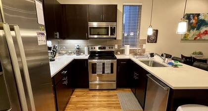 2 bedroom townhome w fire place & rooftop deck.