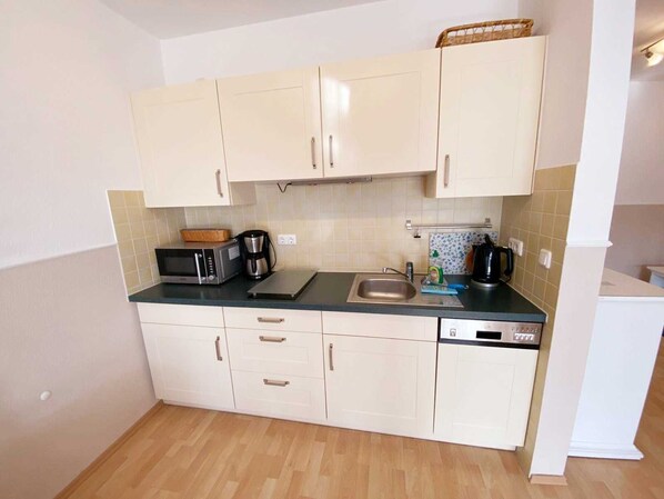Fridge, microwave, dishwasher, coffee/tea maker