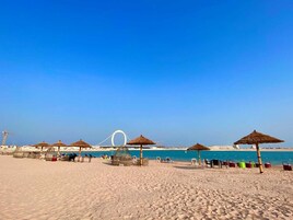 Private beach, beach towels, water skiing