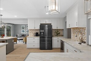 Fridge, microwave, oven, stovetop - Spacious Home offers quality and comfort. (Bakersfield)
