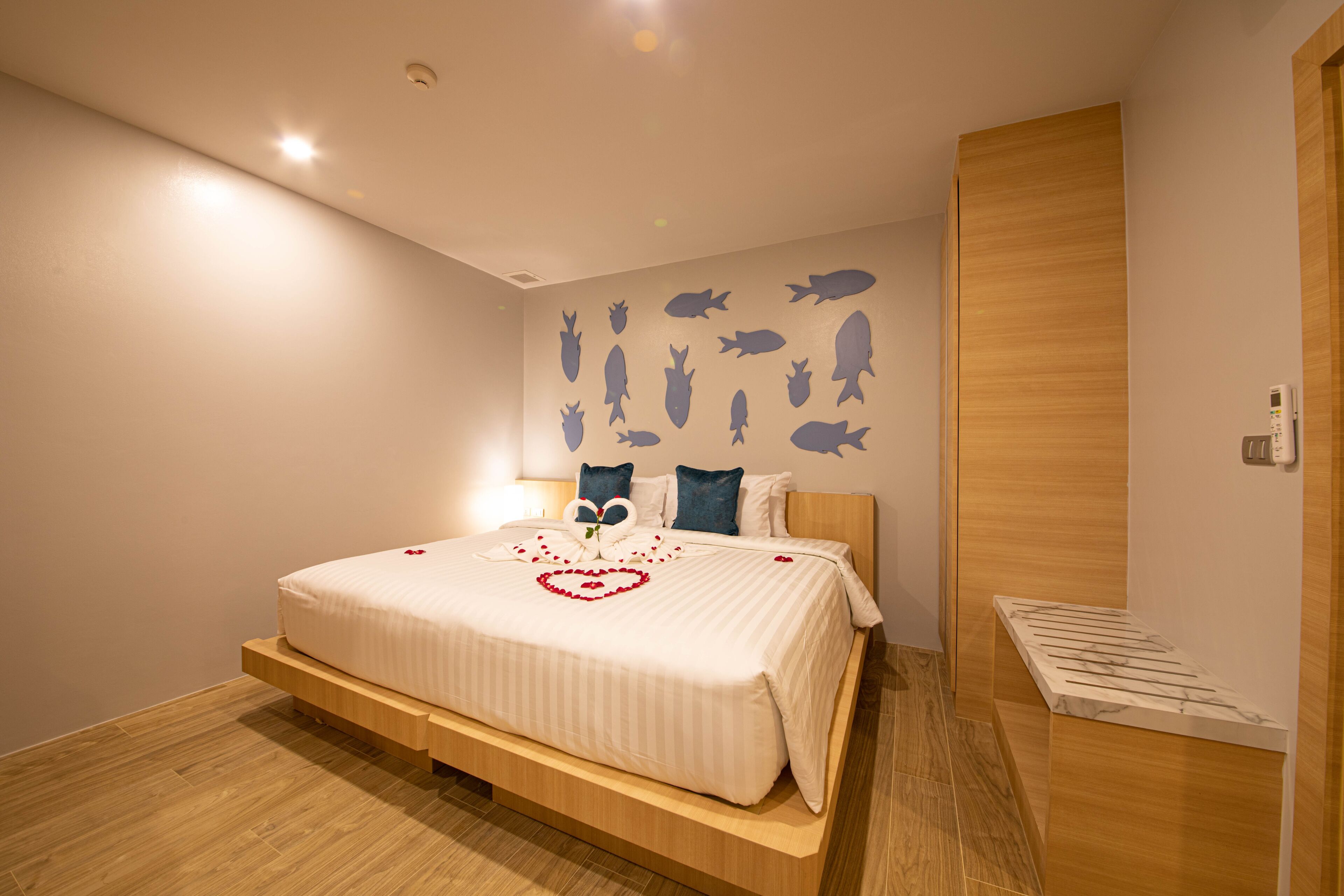 Family Suite, 2 Bedrooms | Minibar, in-room safe, individually decorated, desk