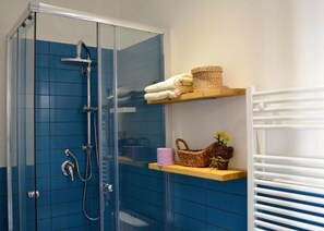 Eco-friendly toiletries, hair dryer, towels