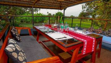 Deluxe Double Room | Living area | Flat-screen TV, printers