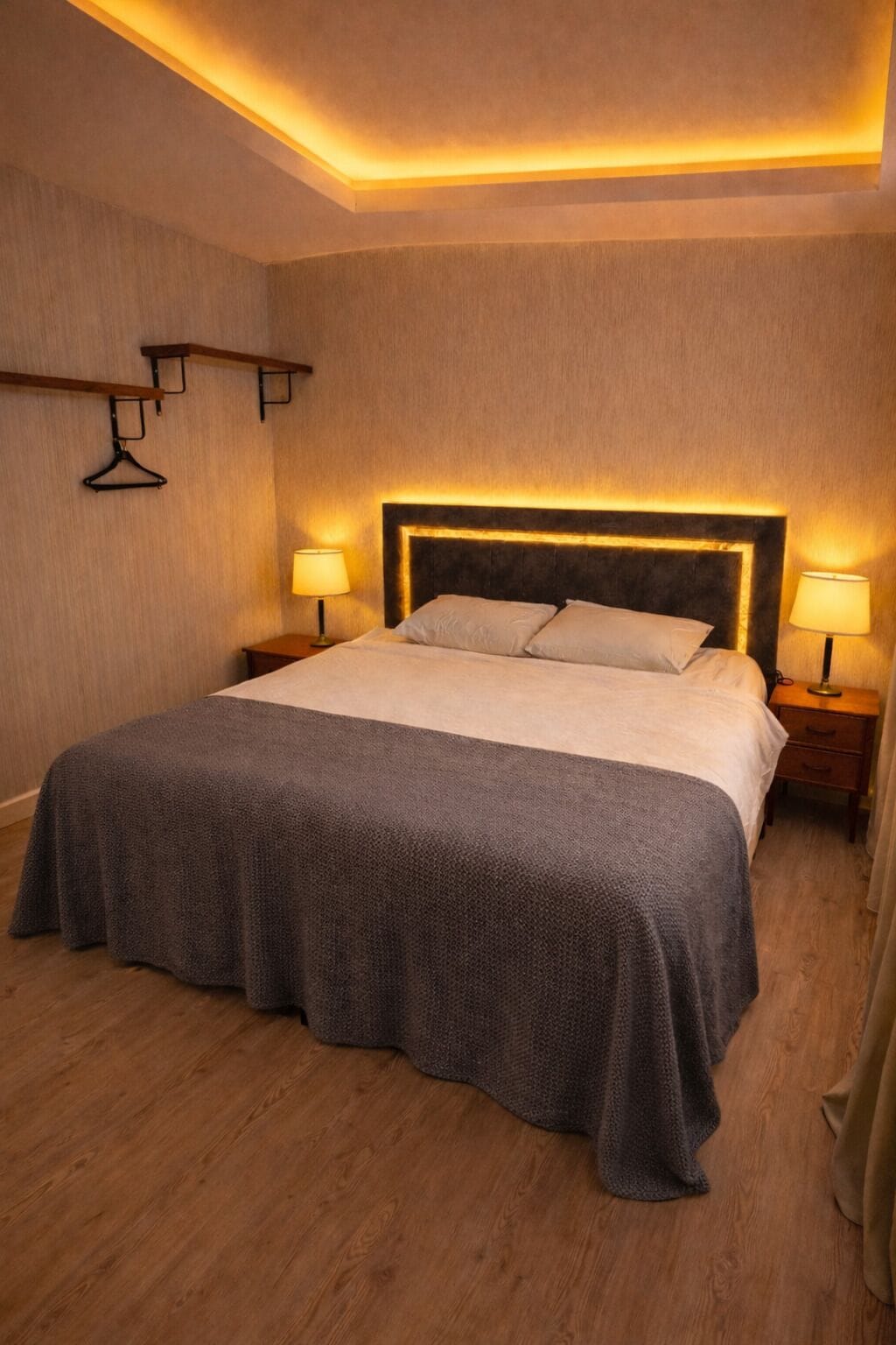 Hypo-allergenic bedding, desk, laptop workspace, blackout drapes