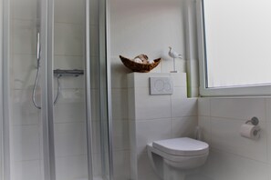 Bathtub, hair dryer, soap