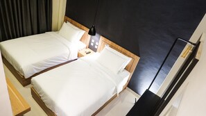 Habitación Deluxe con 2 camas individuales | Escritorio y wifi gratis
