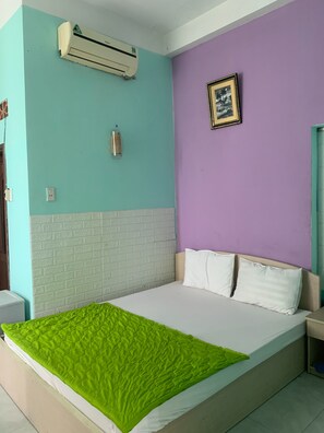 Family Room | Minibar, desk, free WiFi, bed sheets - Happy Hotel Binh Tan (Ho Chi Minh City)