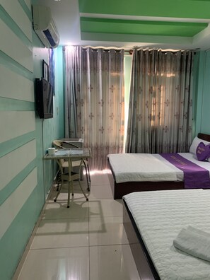 Kamar Double Keluarga | Minibar, meja kerja, Wi-Fi gratis, dan seprai linen