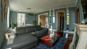 Exclusive Double Room | Living area | Fireplace