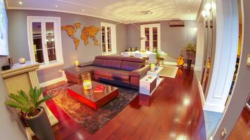 Exclusive Double Room | Living area | Fireplace