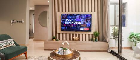 Apartment, 3 Bedrooms | Living area | 32-inch LCD TV with cable channels, TV