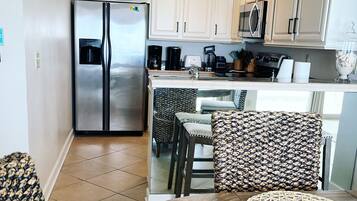 Coffee/tea maker, fridge, microwave, oven