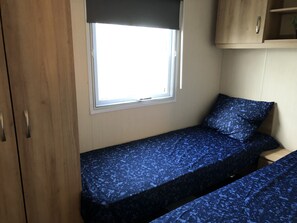 2 bedrooms, travel cot, WiFi, bed sheets