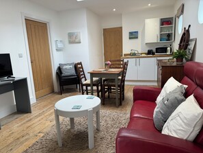 Captain Cabin | Oppholdsområde | En 26-tommers Flatskjerm-TV med digitale kanaler samt TV